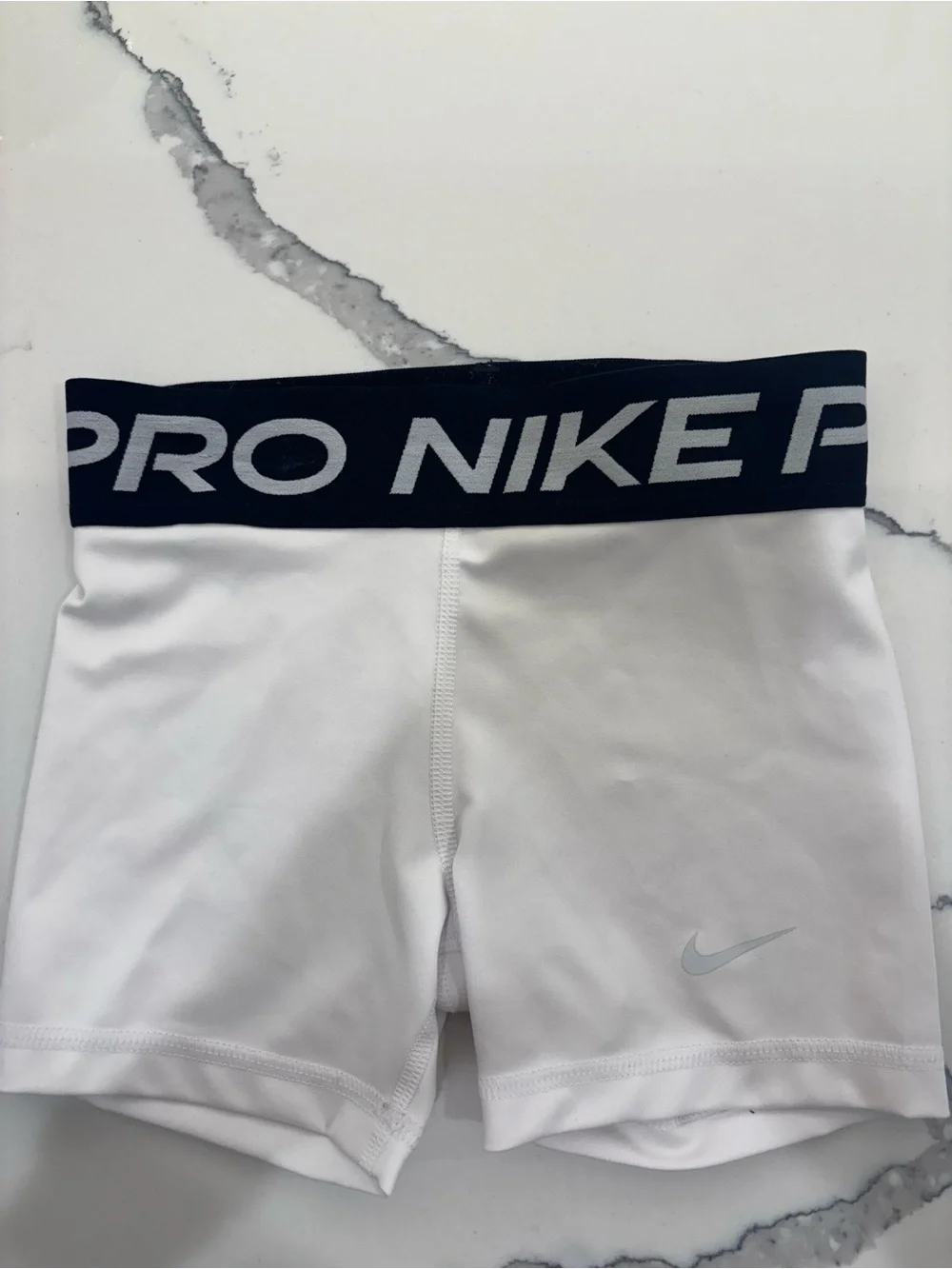 Nike Pro youth White Shorts with Black Waistband and Silver Logo